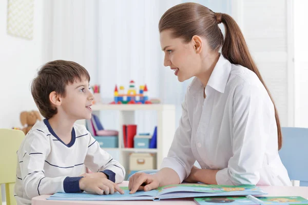 Cute little boy reading book — Stock Photo, Image