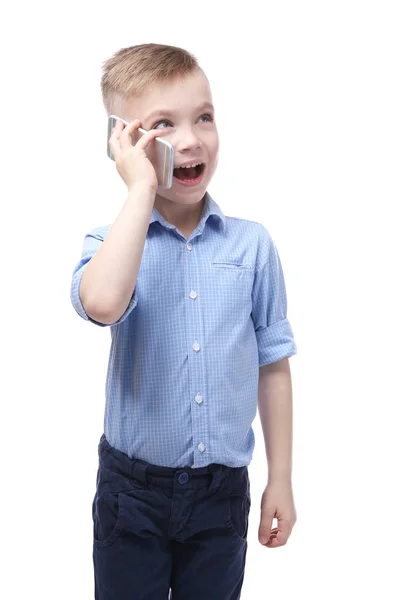 Liten pojke talar av mobiltelefon — Stockfoto