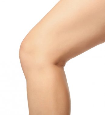 Leg of young woman on white background, closeup. Leg pain concept clipart