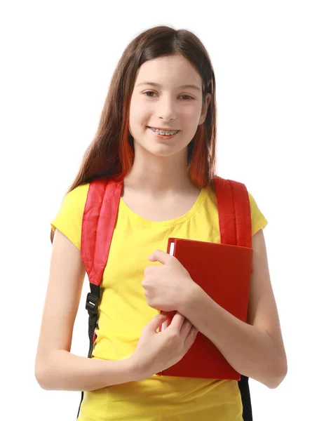 Pretty girl with schoolbag and book Royalty Free Stock Photos