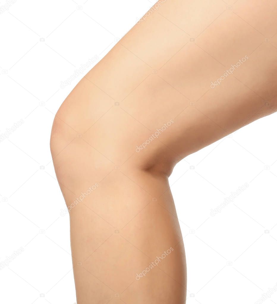 Leg of young woman on white background, closeup. Leg pain concept