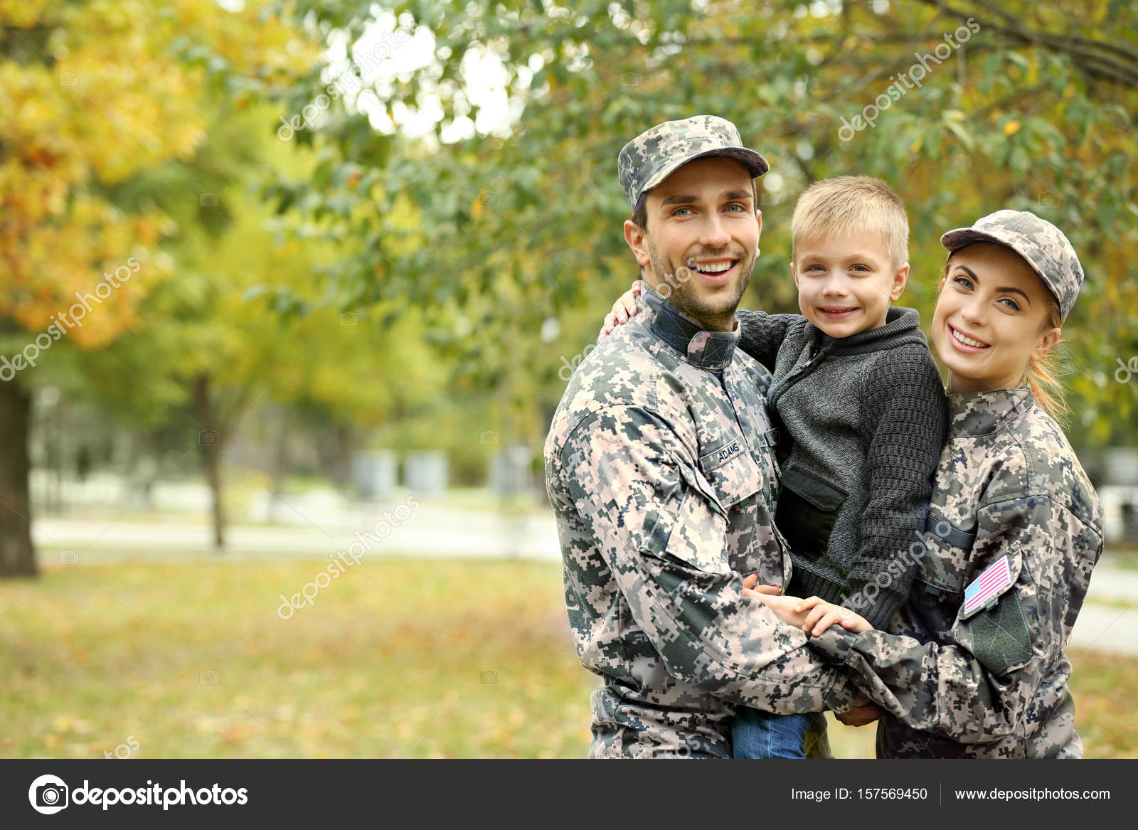 Military family reunited on a sunny day Stock Photo by ©belchonock ...