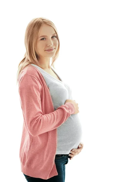 Těhotná žena na pozadí — Stock fotografie