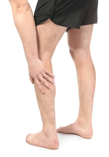 Man suffering from pain in leg — Stock Photo, Image