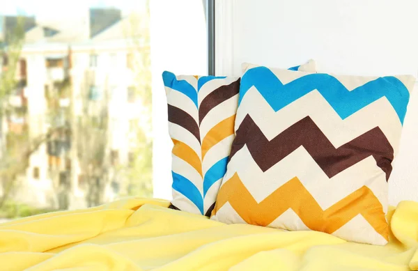 Two pillows and yellow plaid — Stock Photo, Image