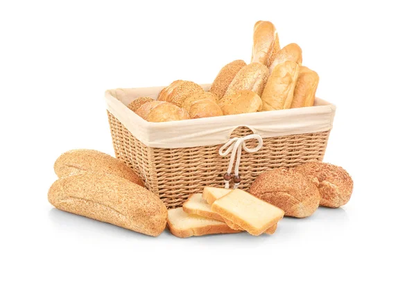 Wicker basket and different bread — Stock Photo, Image