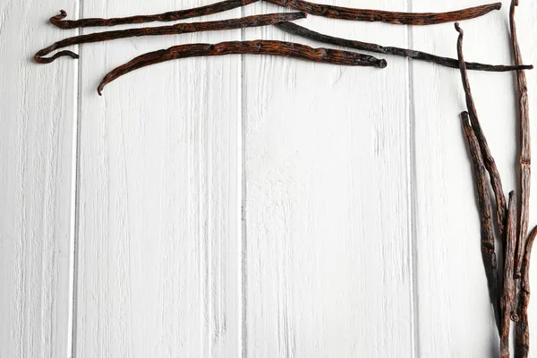 Kurutulmuş vanilya çubukları ile kompozisyon — Stok fotoğraf