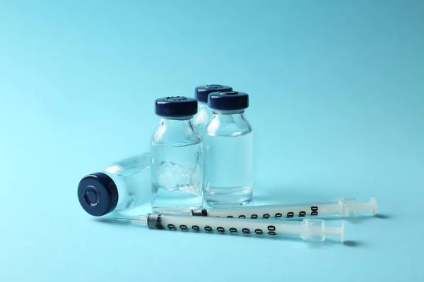 Vaccine in vials with syringe — Stock Photo, Image
