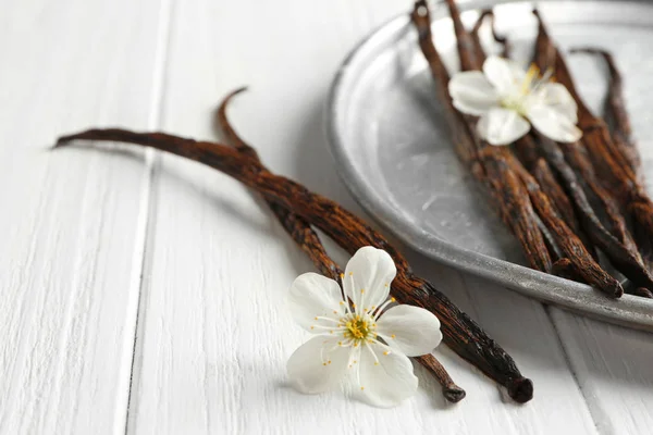 Composition with dried vanilla sticks — Stock Photo, Image