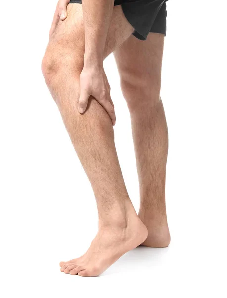 Hombre que sufre de dolor en la pierna —  Fotos de Stock