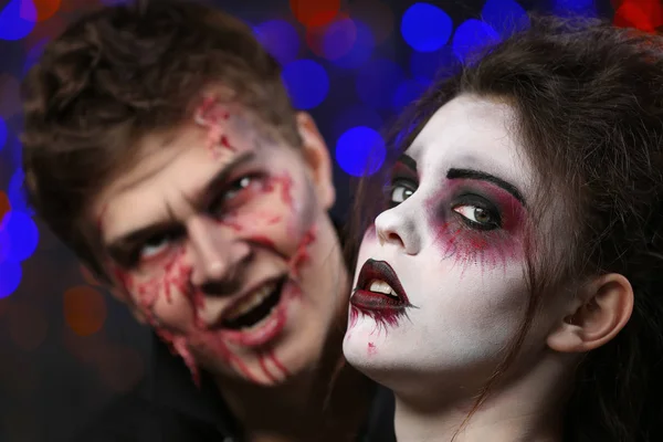 Giovane donna e uomo con trucco di Halloween alla festa, primo piano — Foto Stock