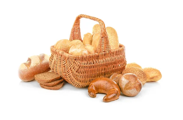 Wicker basket and different bread — Stock Photo, Image
