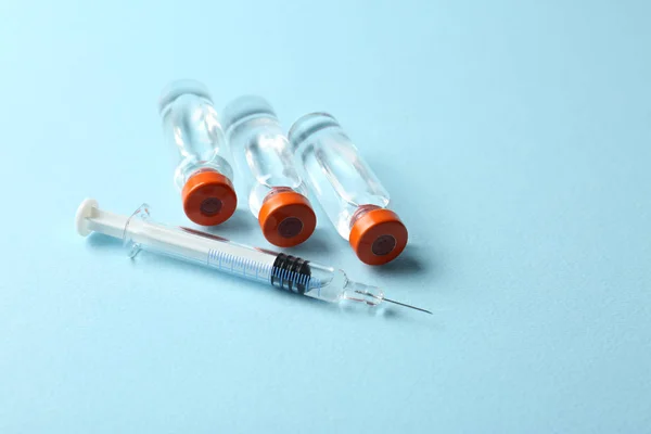 Vaccine in vials with syringe — Stock Photo, Image