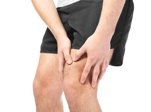 Man suffering from pain in leg — Stock Photo, Image