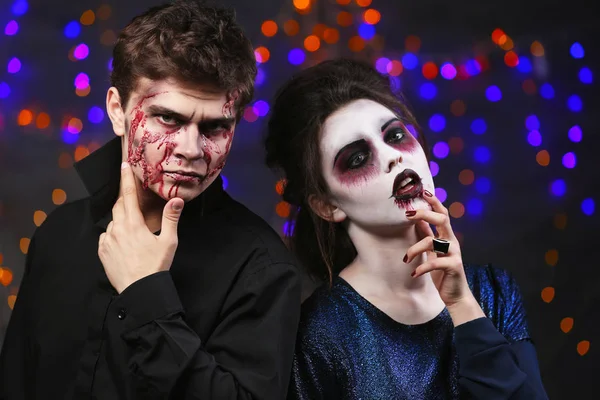 Jovem e mulher com maquiagem de Halloween na festa — Fotografia de Stock