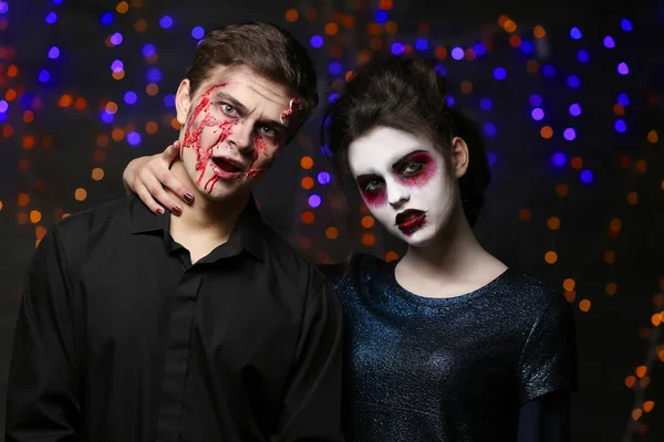 Jovem e mulher com maquiagem de Halloween na festa — Fotografia de Stock