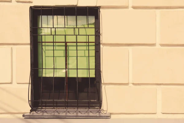 Modern window with metallic lattice — Stock Photo, Image