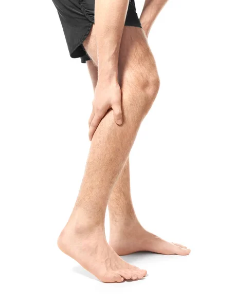 Man suffering from pain in leg — Stock Photo, Image