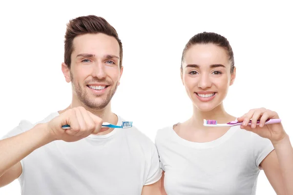 Šťastný pár čištění zubů — Stock fotografie