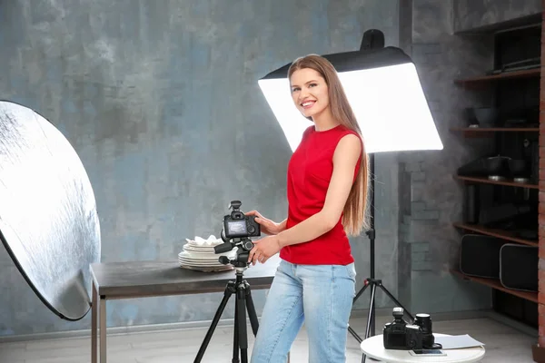 Beautiful young woman during photography classes — Stock Photo, Image