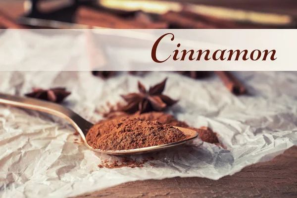 Spoon with powdered cinnamon — Stock Photo, Image