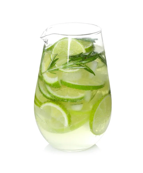 Glass jug of tasty lemonade with lime slices and rosemary — Stock Photo, Image