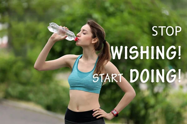 Fitness quotes. Text STOP WISHING, START DOING on background. Young woman drinking water after run in park