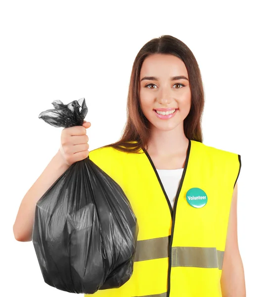 Jovem voluntário com saco de lixo — Fotografia de Stock