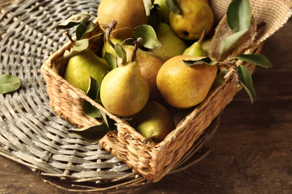 Fresh pears in wicker box — Stock Photo, Image