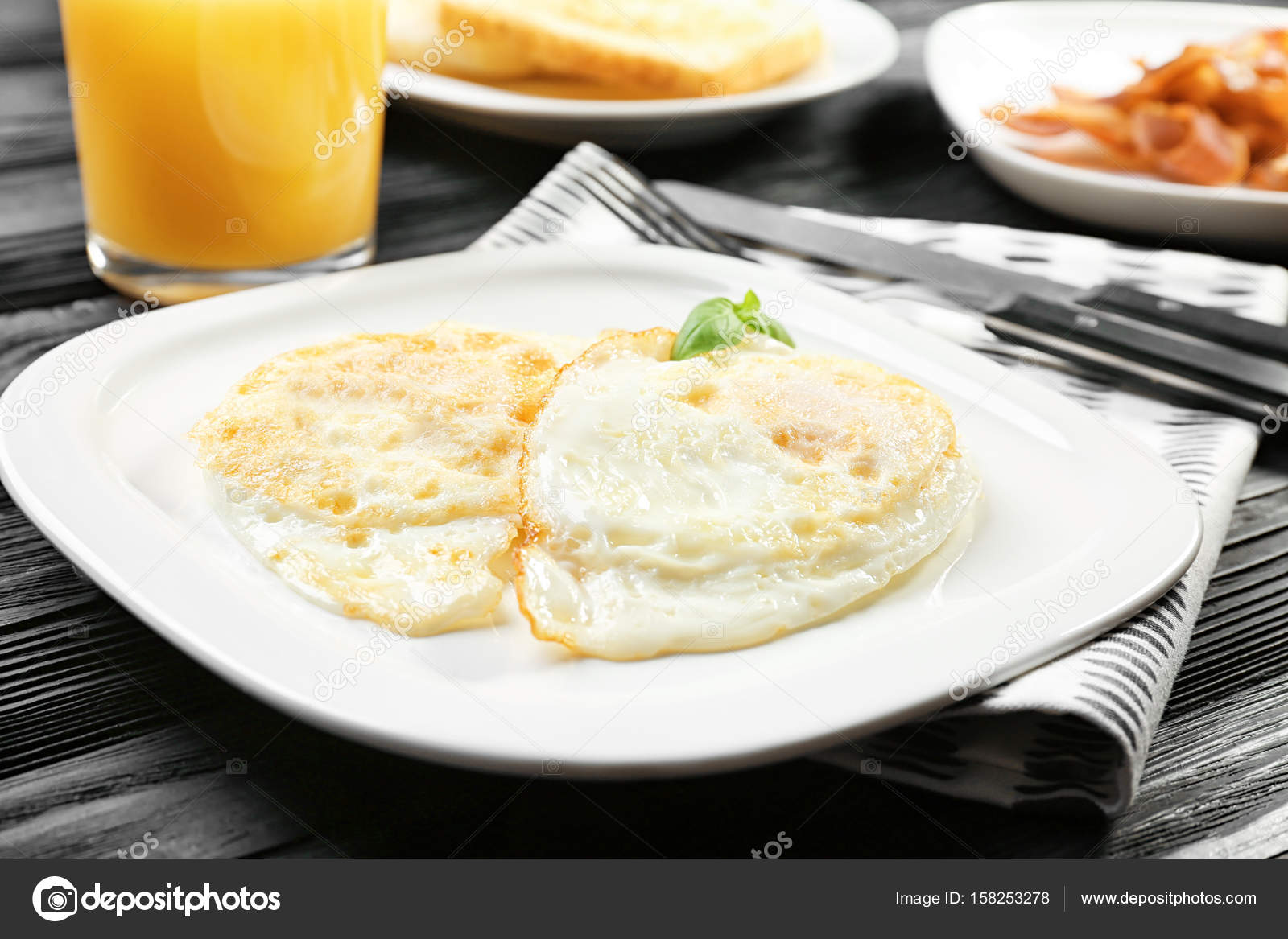 Delicious over hard eggs Stock Photo by ©belchonock 158253278