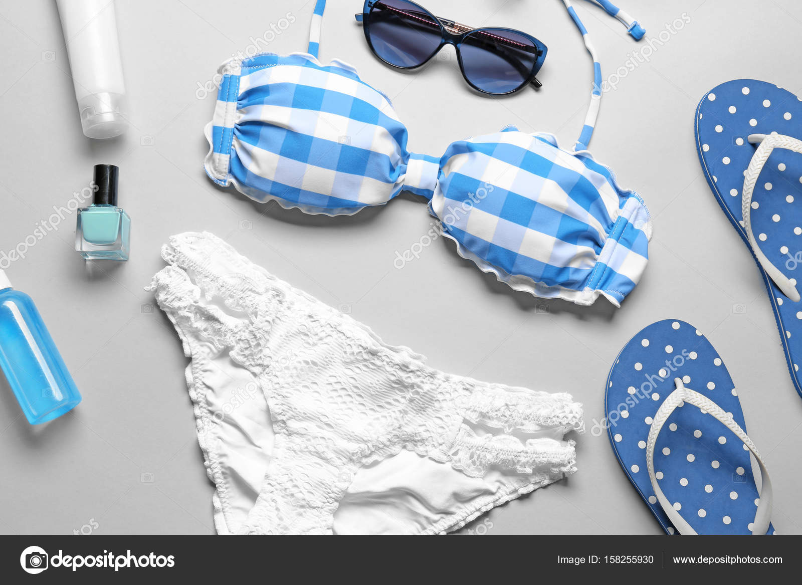Bikini and beach accessories — Stock Photo © belchonock 158255930