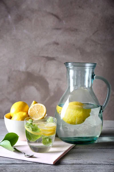 Composition with cold lemon water — Stock Photo, Image