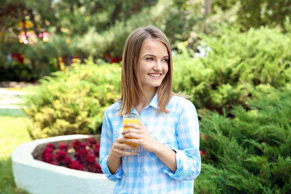 Beautiful woman with juice — Stock Photo, Image