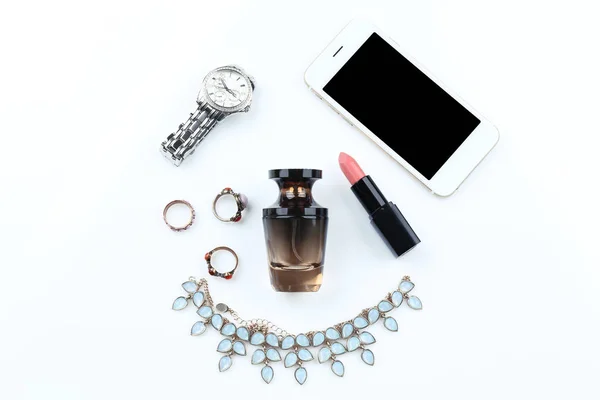 Accessories with cosmetics and phone — Stock Photo, Image