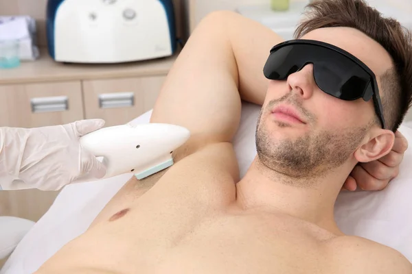Man getting laser epilation — Stockfoto
