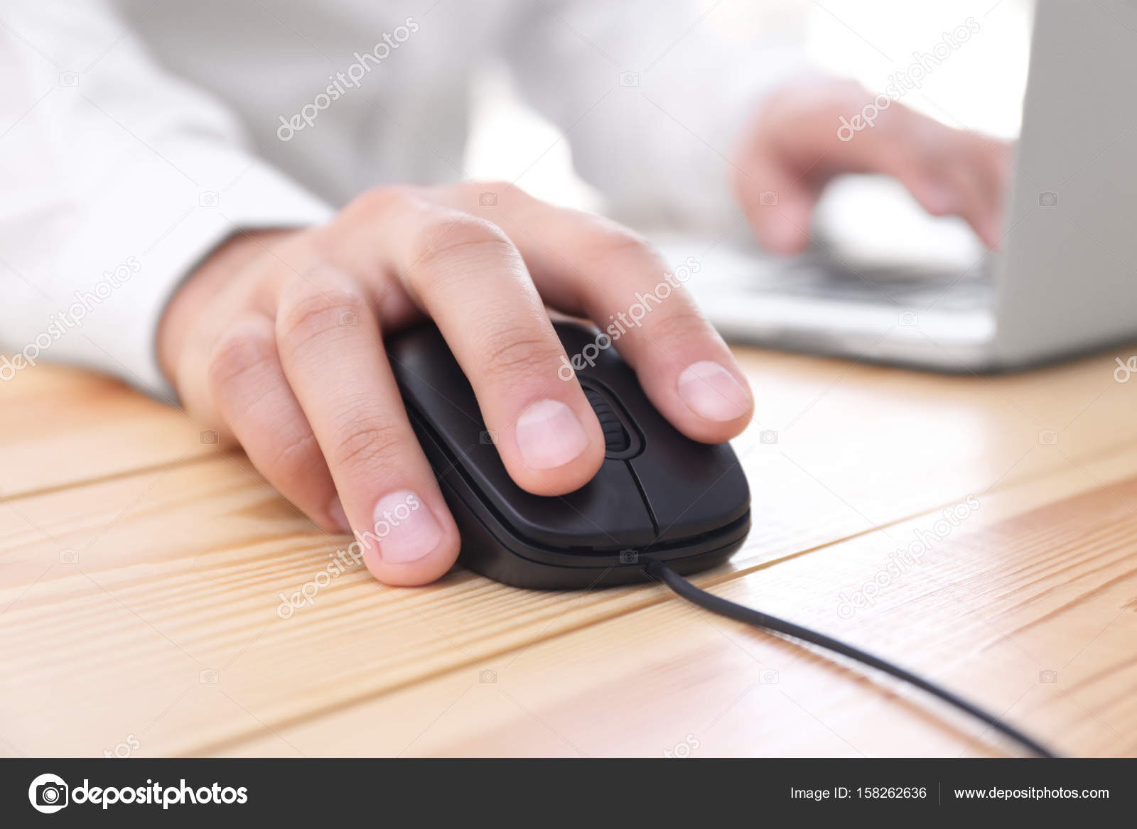 Verlichten insect Master diploma Male hand with computer mouse Stock Photo by ©belchonock 158262636