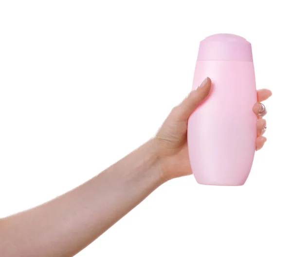 Hand with bottle of cosmetic product — Stock Photo, Image