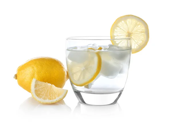 Glass of cold lemon water with ice — Stock Photo, Image