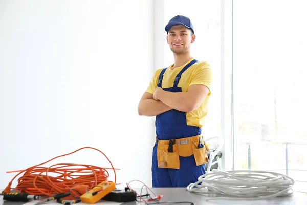 Young electrician at workplace — Stock Photo, Image