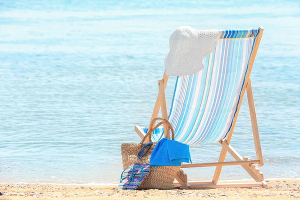 Beach chair and accessories — Stock Photo, Image