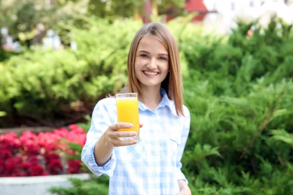 Beautiful woman with juice — Stock Photo, Image