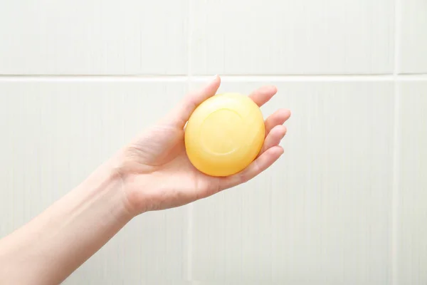 Hand of woman with soap — Stock Photo, Image