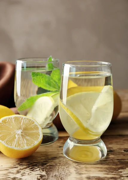 Composition with cold lemon water — Stock Photo, Image