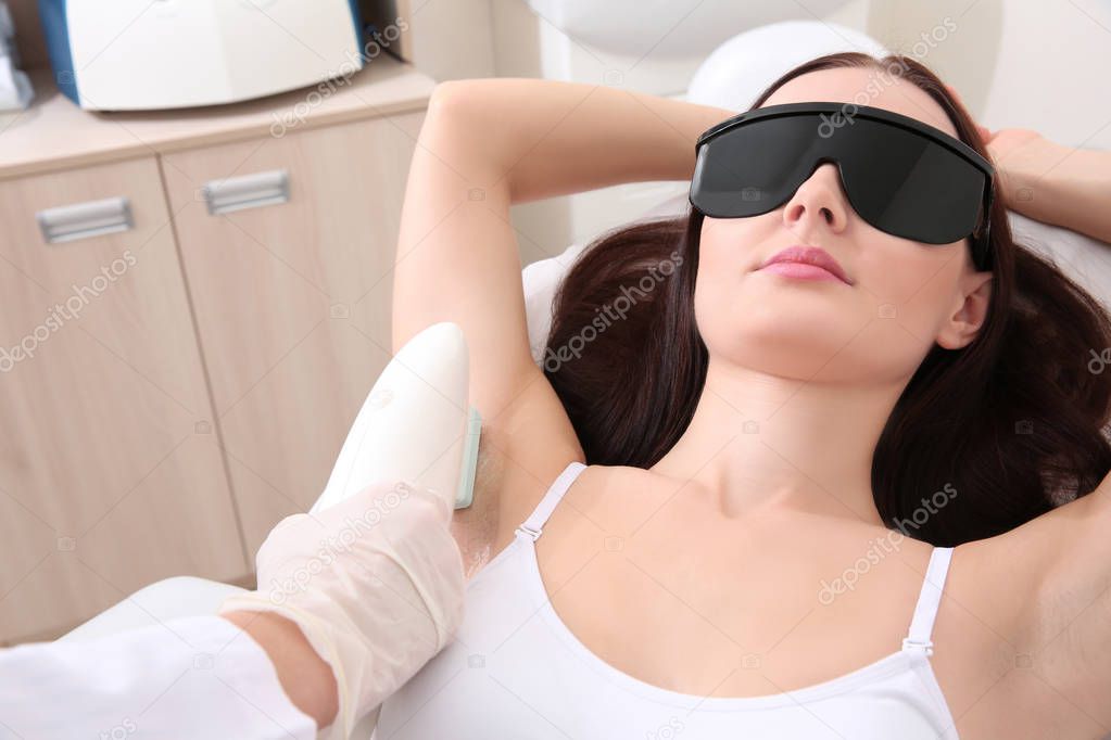 woman getting laser epilation 