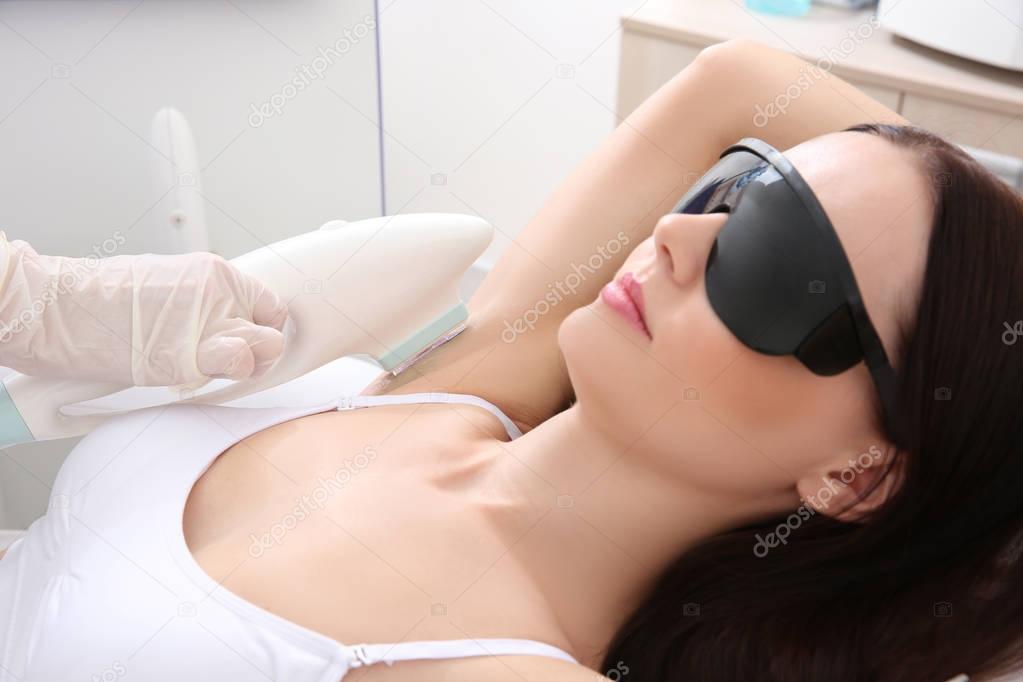 woman getting laser epilation 