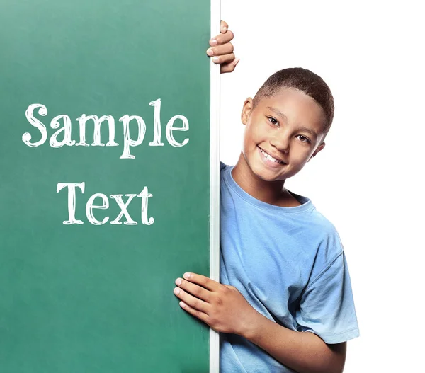African-American boy and chalkboard — Stock Photo, Image
