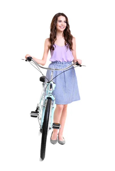 Young woman with bicycle Stock Photo