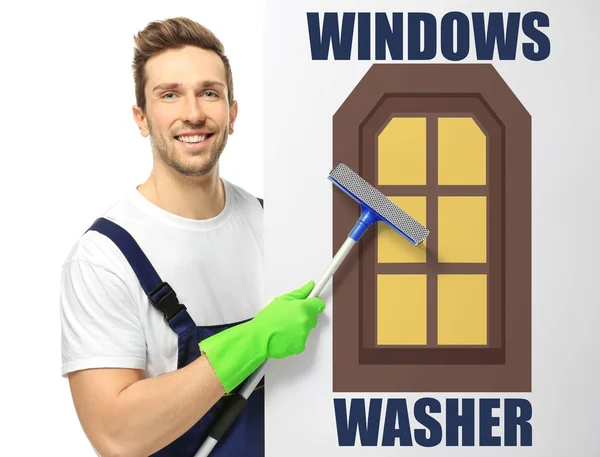 年轻窗户清洁工与刮板和白色背景上的海报 — 图库照片