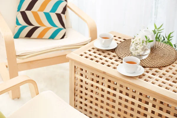 Wooden coffee table in modern veranda interior — Stock Photo, Image