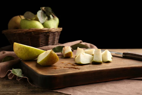 Sliced pear on board